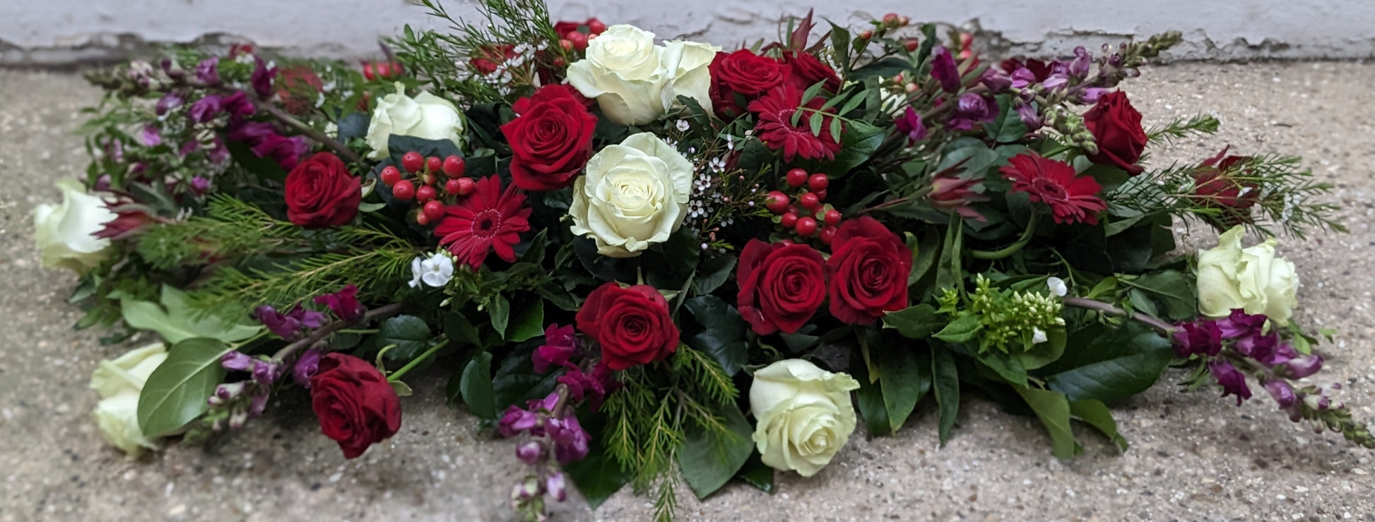 Rose Casket spray - Quality Flowers from Ann's Flowers - Just £150! Shop now at Ann's Flowers